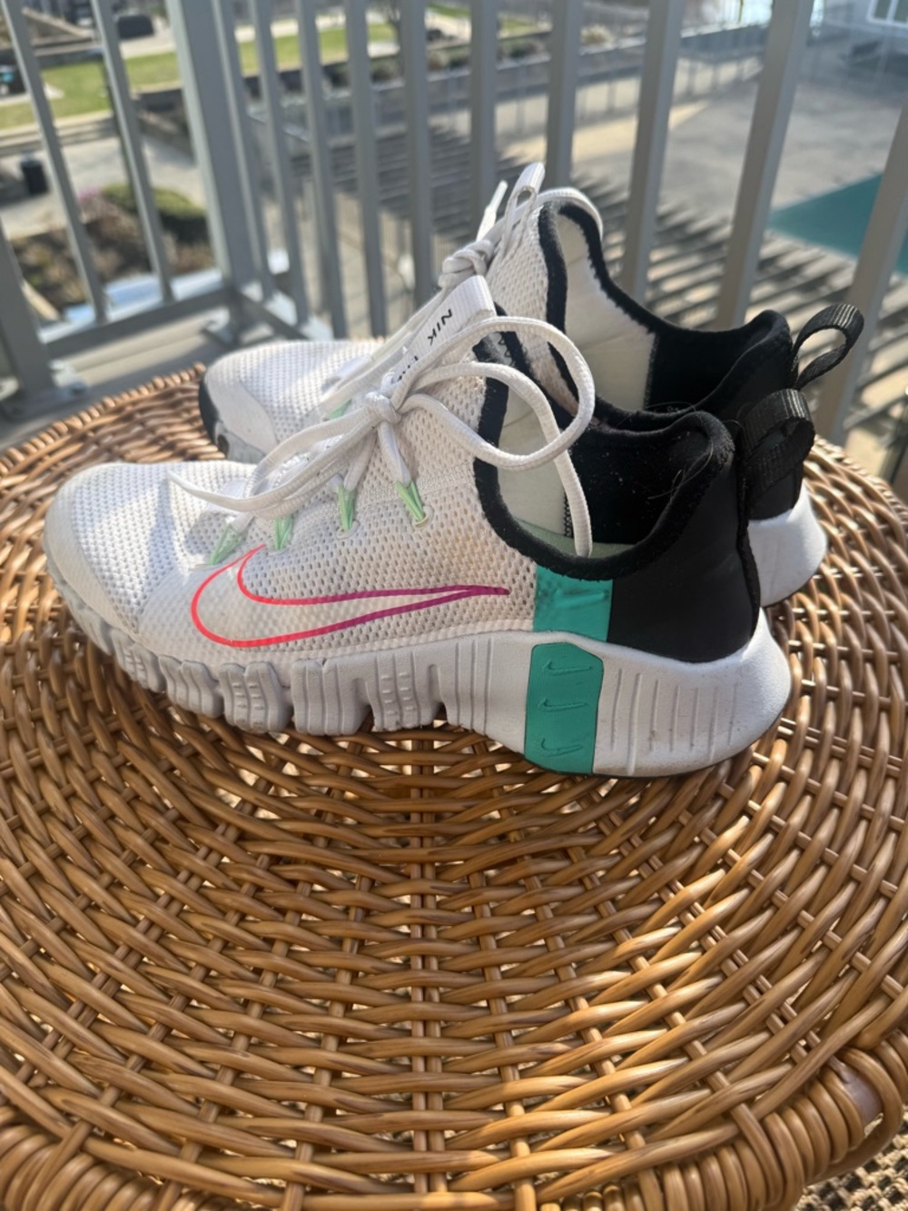 Nike White Athletic Sneakers with Pink Swoosh and Teal Accents